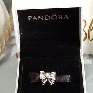 Pandora "BOW" Charm. Very pretty. Perfectly tied